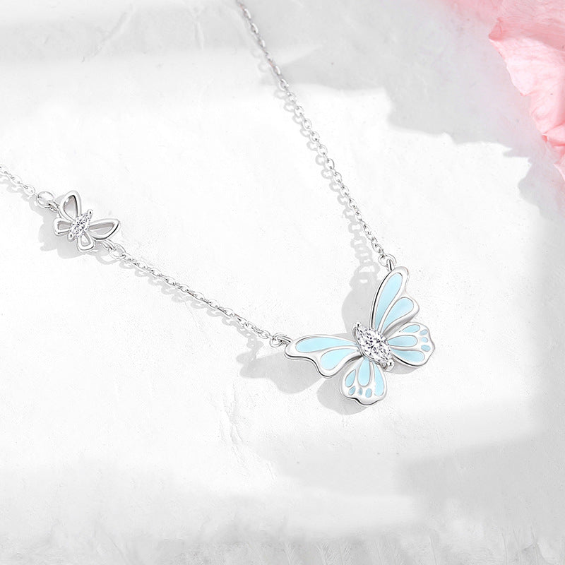 Platinum-Plated S925 Sterling Silver Butterfly Pendant with Light Blue Glowing 5A Zirconia