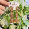 Antique Gold-Tone Ethnic Jhumkas Featuring Flute-Playing Krishna