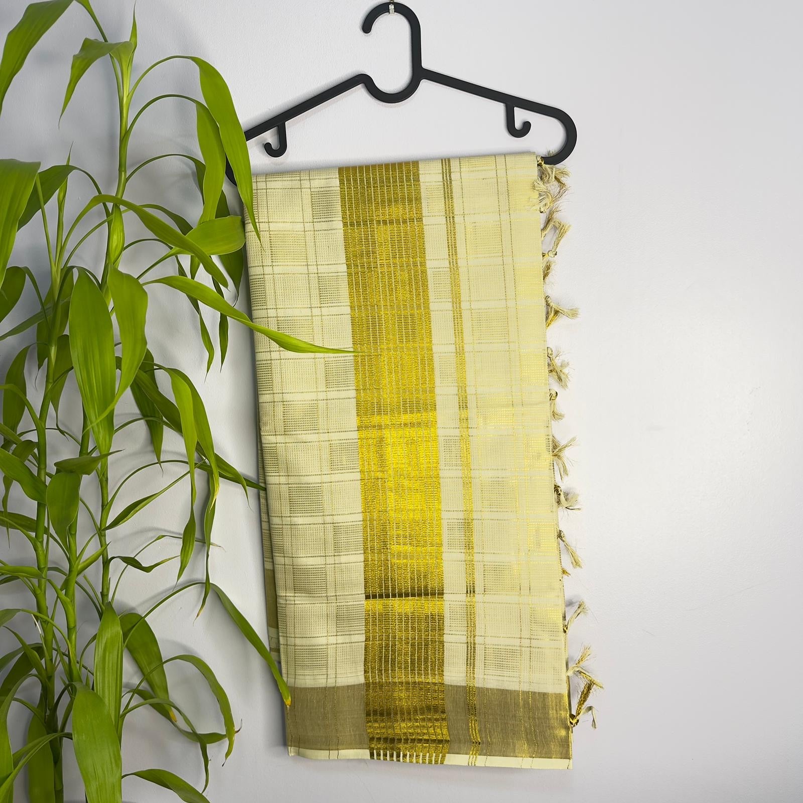 Premium Gold Checkered Kerala Tissue Saree with Tassels