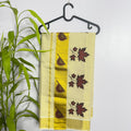Kerala Tissue Saree with Elegant Floral Motifs