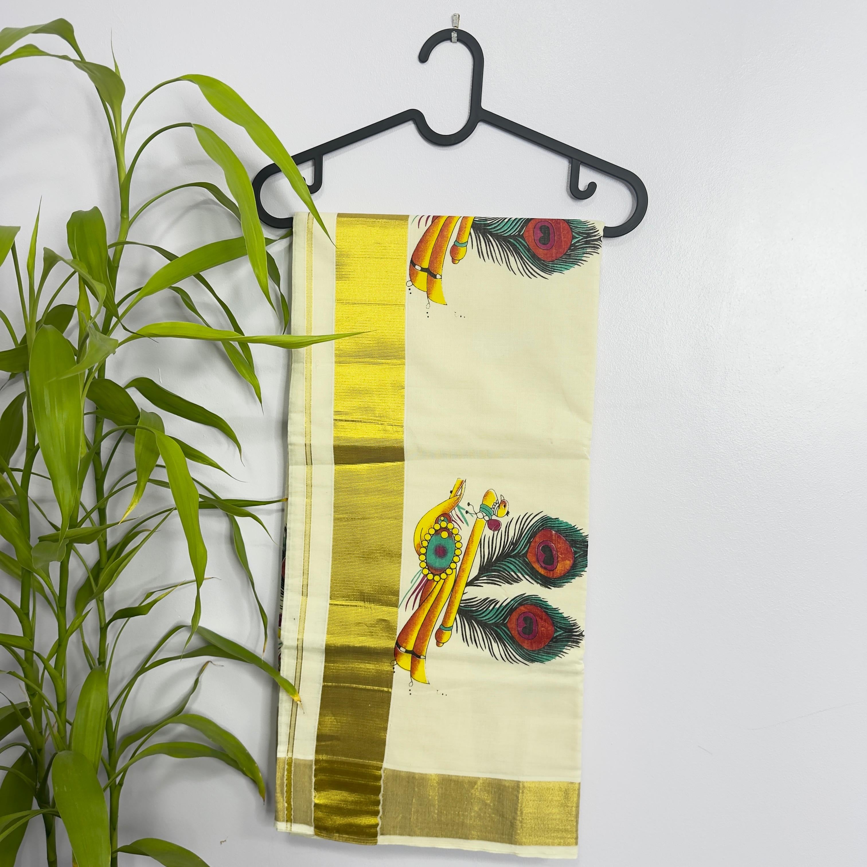 Elegant Kerala Cotton Kasavu Saree with Peacock Feather Motifs