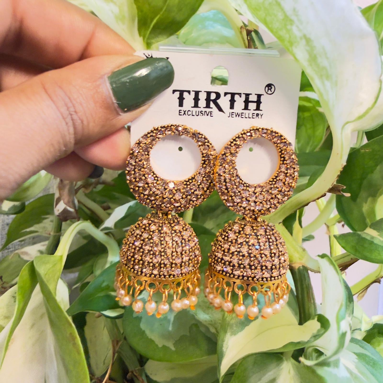 Elegant Champagne Stone Embellished Jhumkas