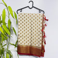 Off-White Semi Banarasi Saree with Contrast Red Border and Tussles