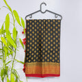 Elegant Black & Gold Semi Banarasi Saree with Contrast Red Border and Tussles