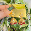 Gold-Plated Traditional Jhumka Earrings with Red Beads