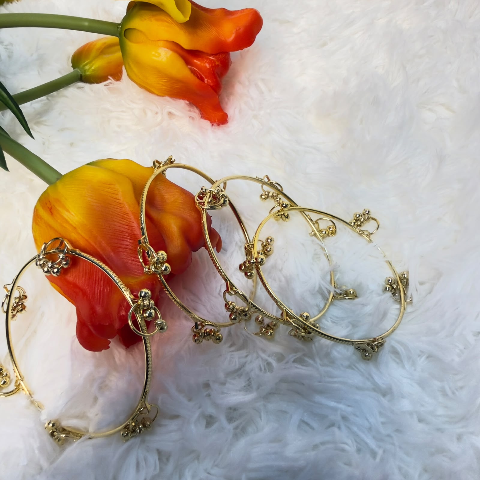 Elegant Gold Mysore Bangles with Dangling Charms